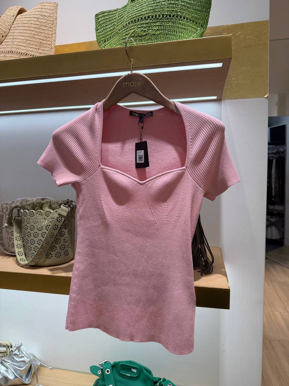Ribbed knit sweater with jewel buttons