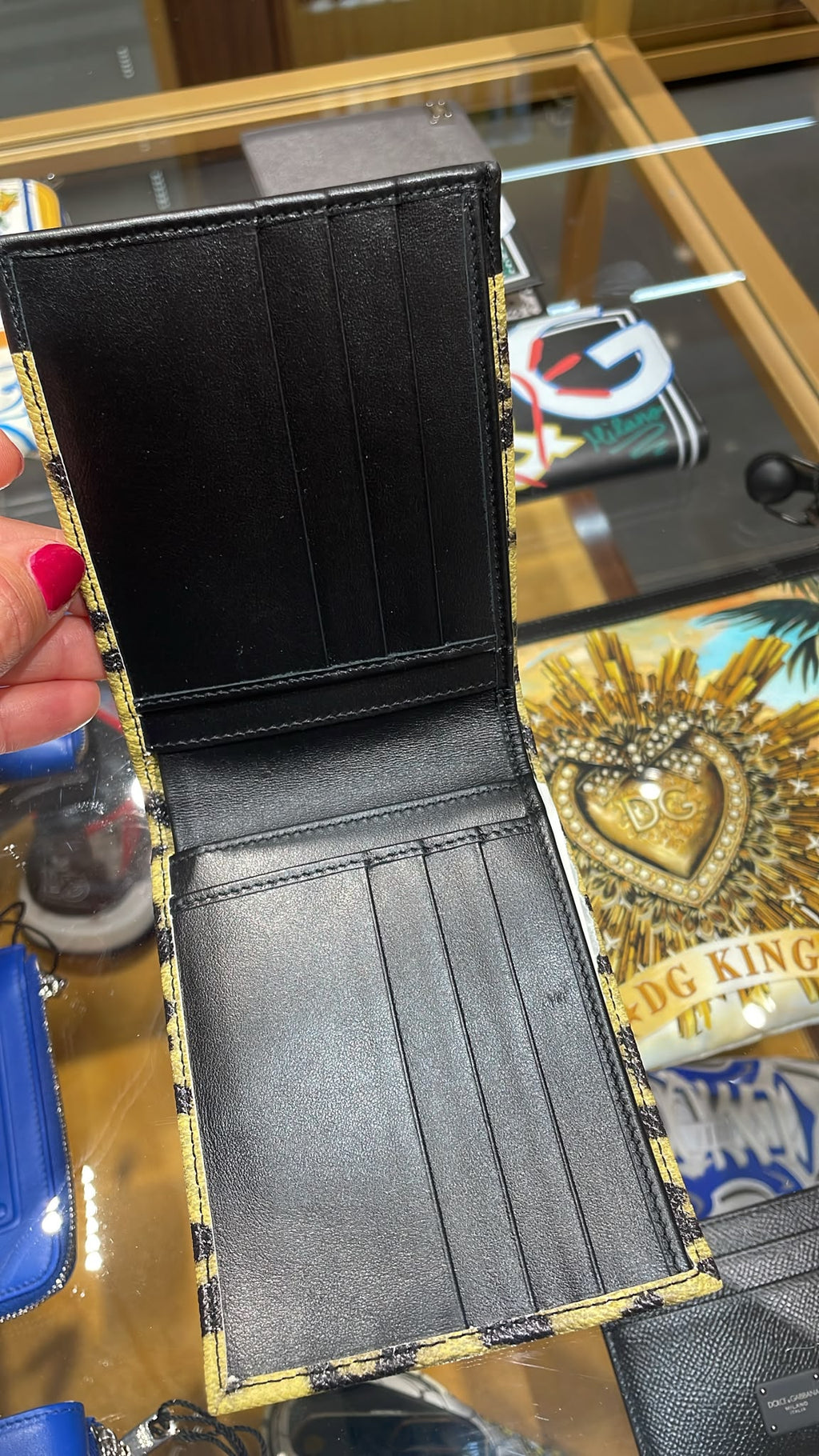 Leopard-print bi-fold wallet