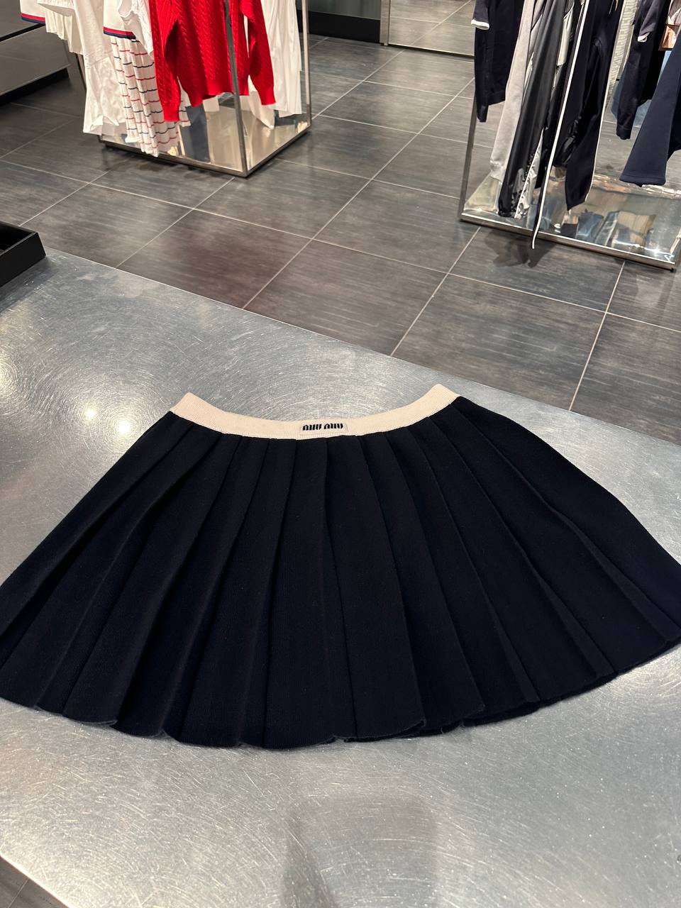 Pleated knit mini skirt