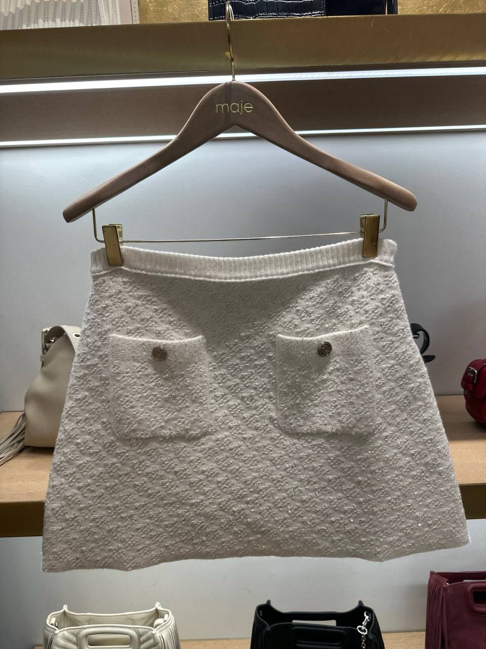 Textured knit mini skirt with pockets