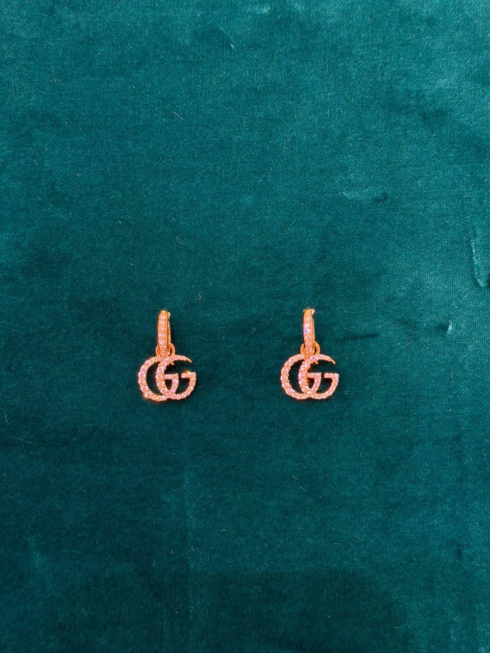 Double G earrings with crystals