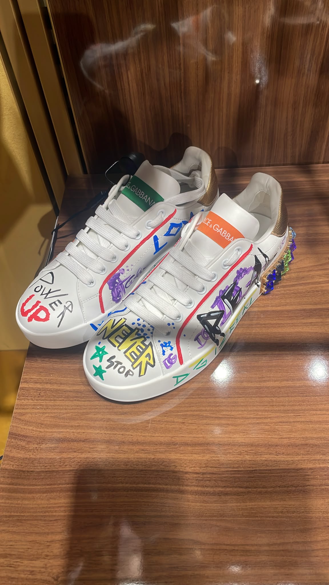 Portofino sneakers with graffiti print and crystals