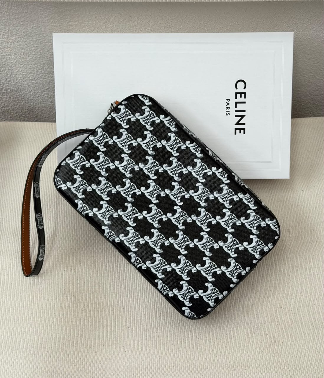 Large Zipped Clutch in Triomphe Canvas