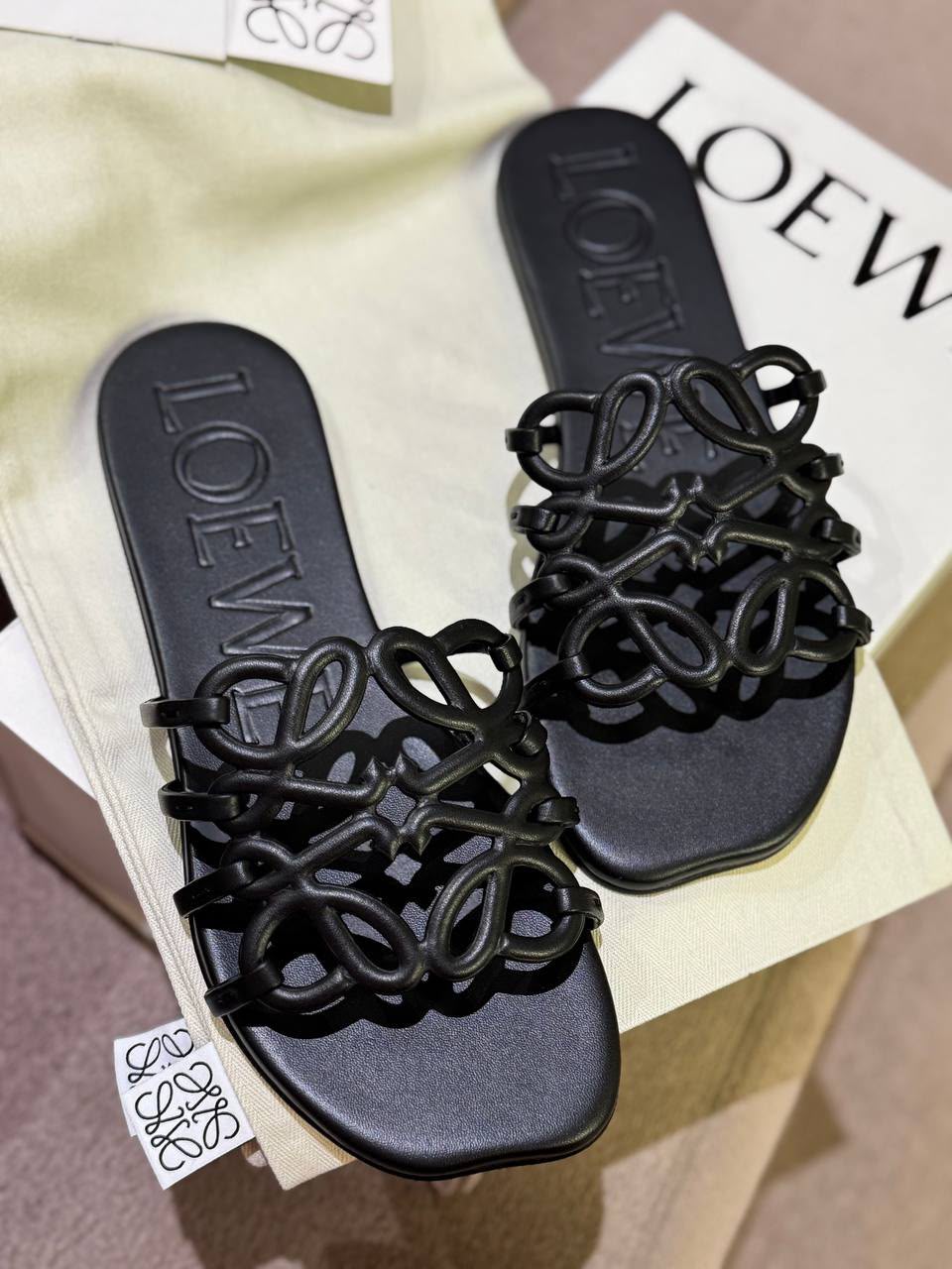 Anagram slide sandals in calfskin