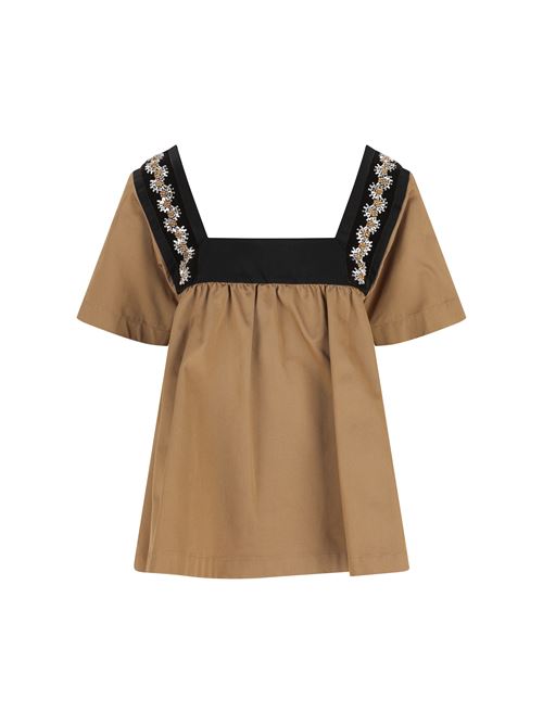 Top realizzato in cotone